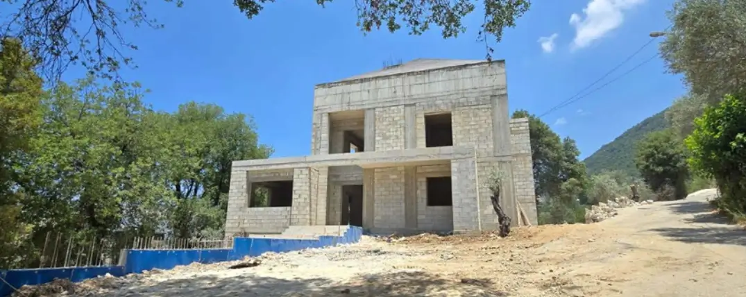 Exterior stone cladding and large window installation — Group Four engineering and contracting Lebanon