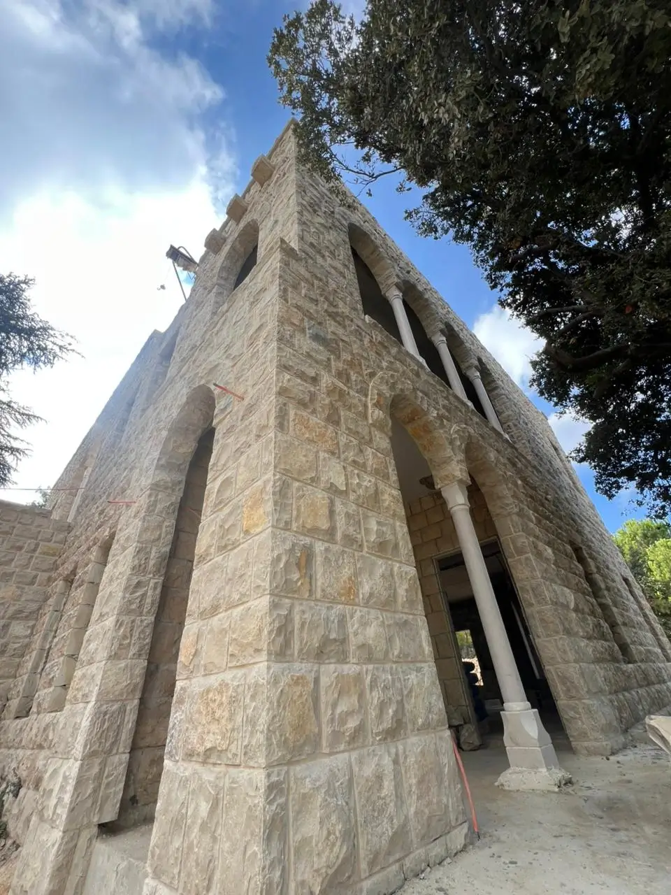 Stone facade and columns being reworked at a Group Four project in the Chouf, Lebanon