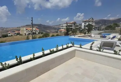 Ramzi Halawani villa structural concrete frame construction multi-level build Badghan Aley Group Four