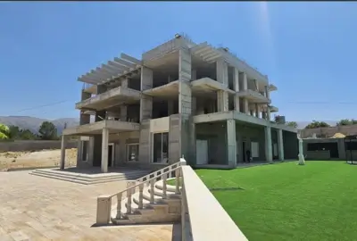Zeinedinne villa terrace and site finishing work Botmi — Group Four construction company